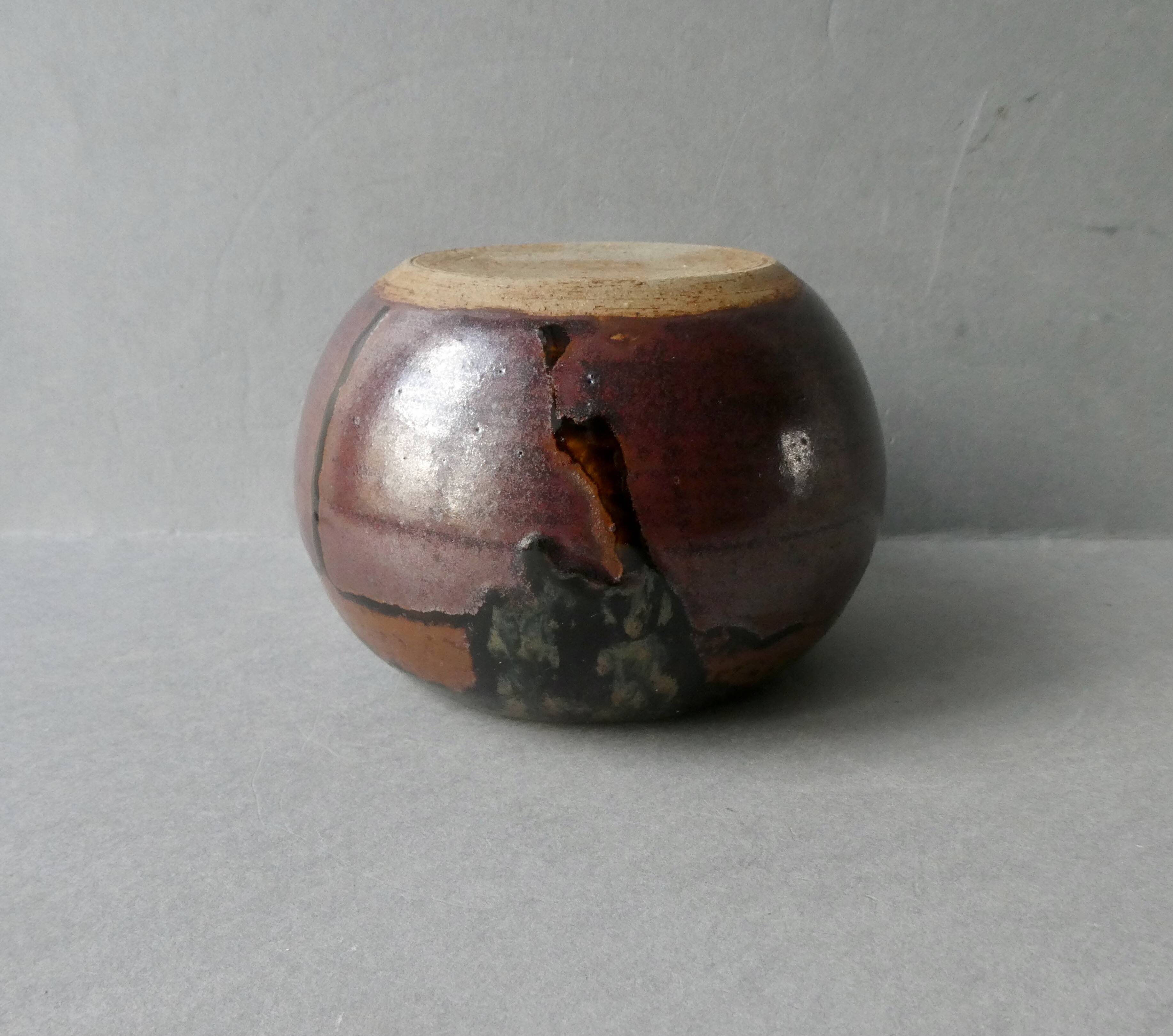 Sandstone ball vase signed Yves Remond