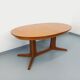 Vintage oval dining table Baumann from the 60s and 70s in teak with extension.