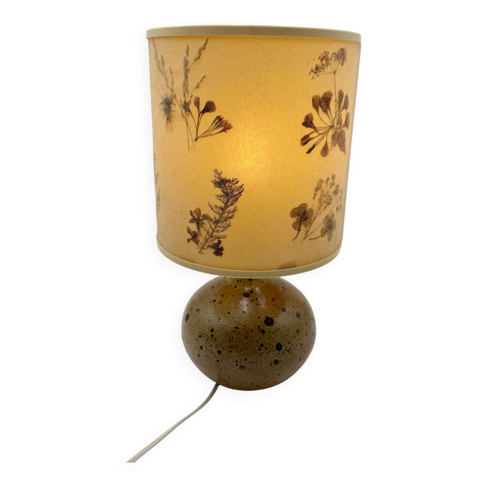 Pyrite stone ball lamp with a lampshade featuring dried flower inclusions.