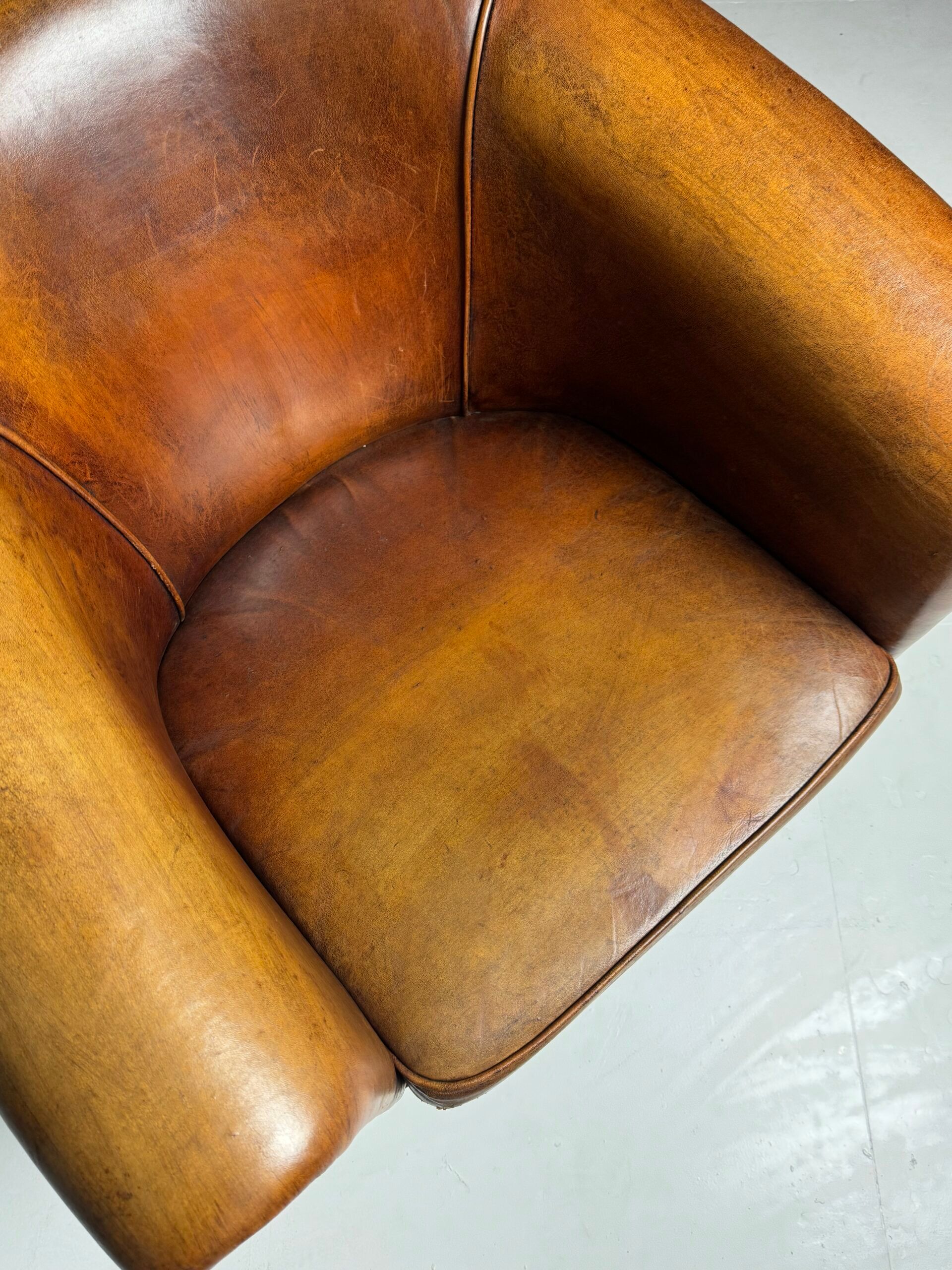 Fauteuil club en peau de mouton 2x classique