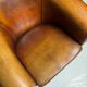 Fauteuil club en peau de mouton 2x classique
