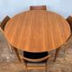 Round table in teak with vintage butterfly extension from the 1960s
