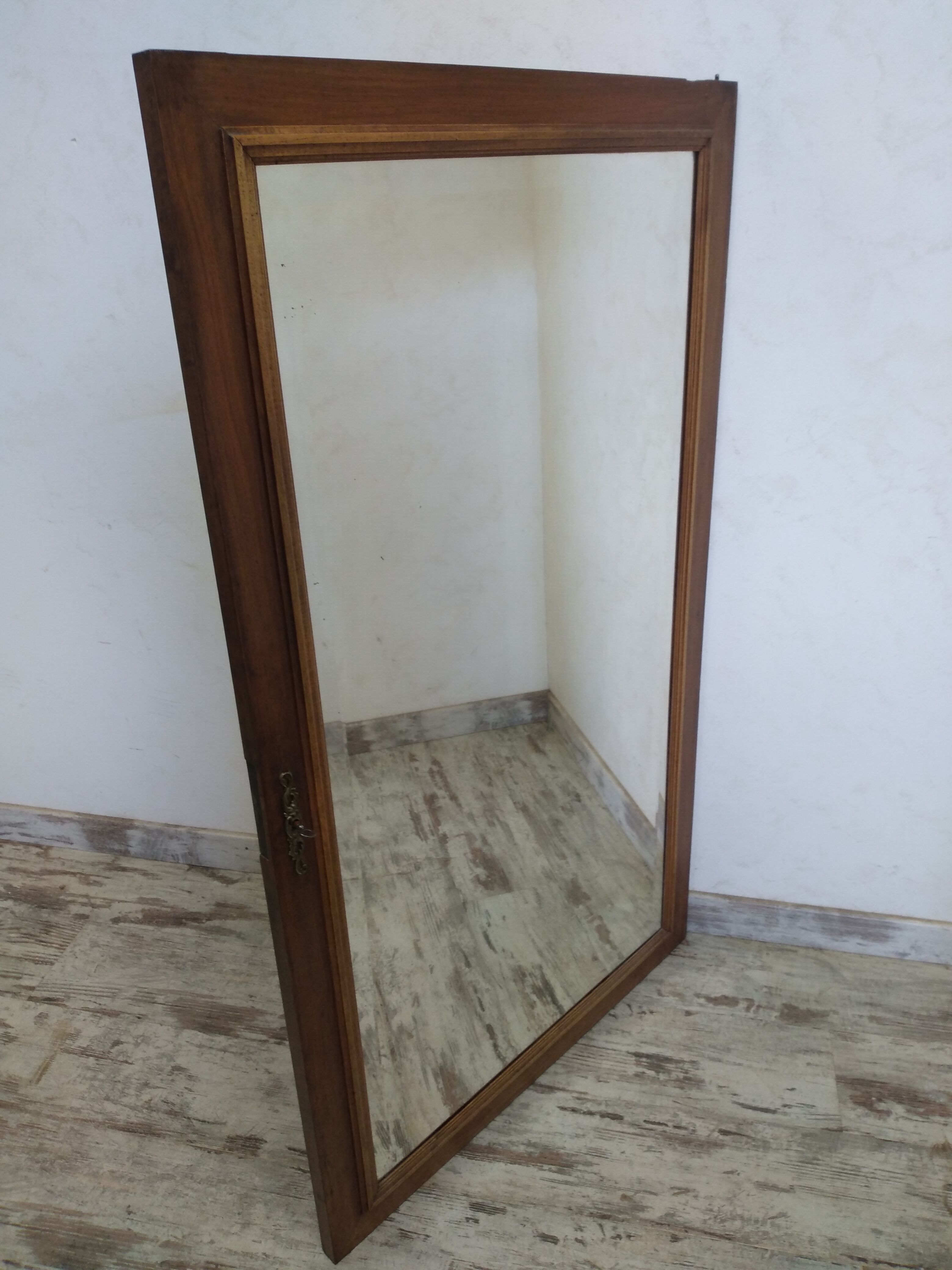 Old hosiery door with mirror
