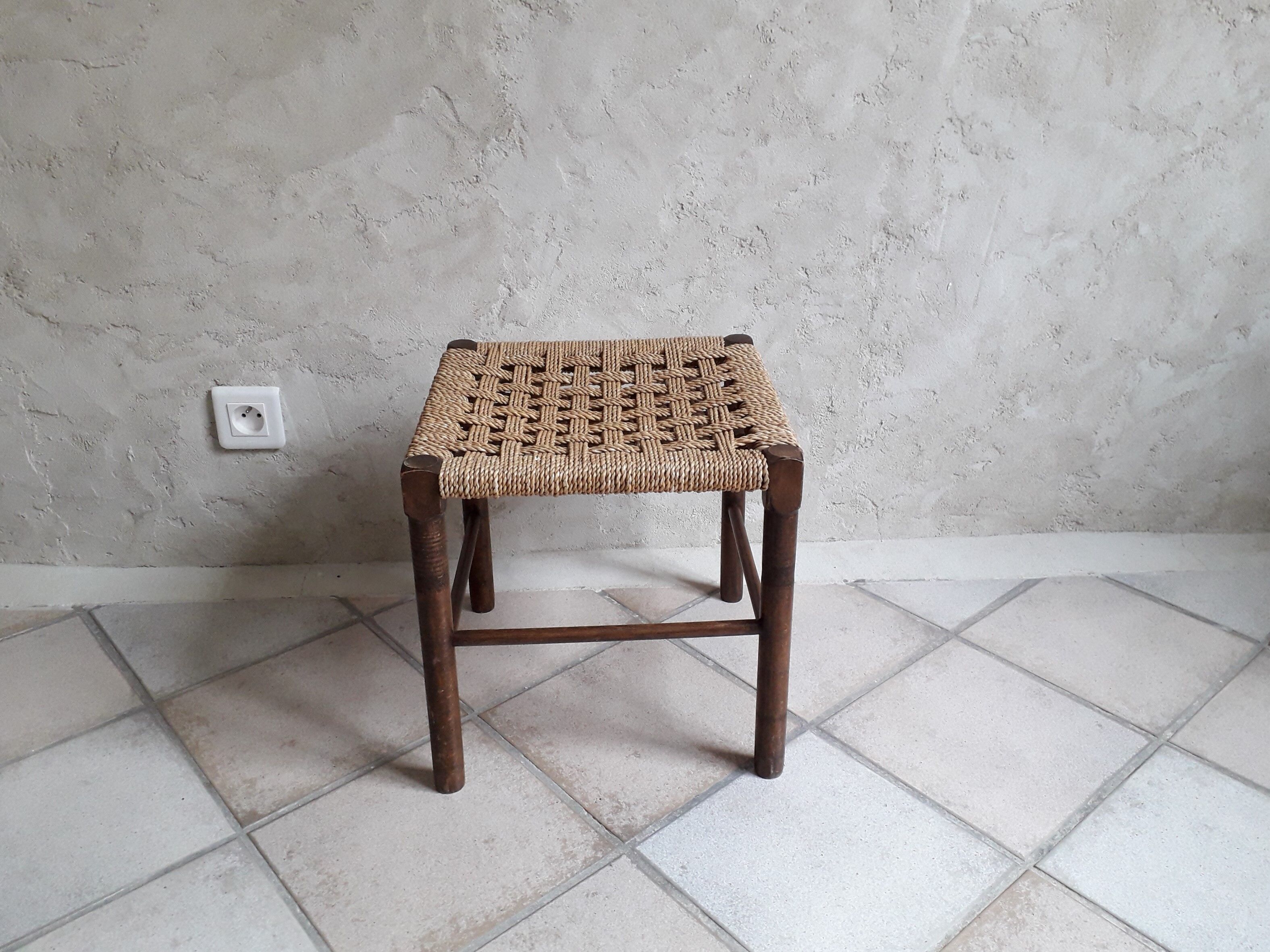 Wooden stool and rope