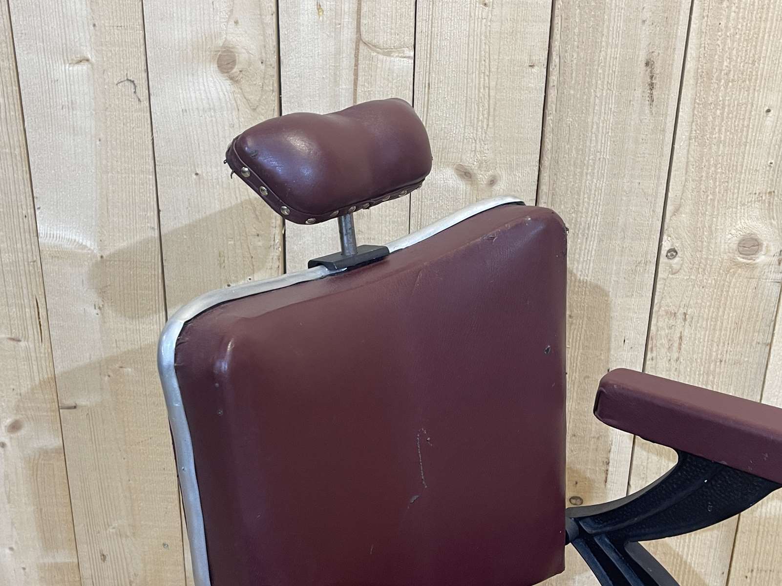 1950s hairdresser's chair covered with skaï - slightly reclining backrest