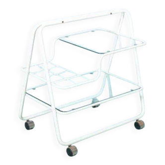 Space age dessert trolley from the 1970s, with metal tubes and glass trays.