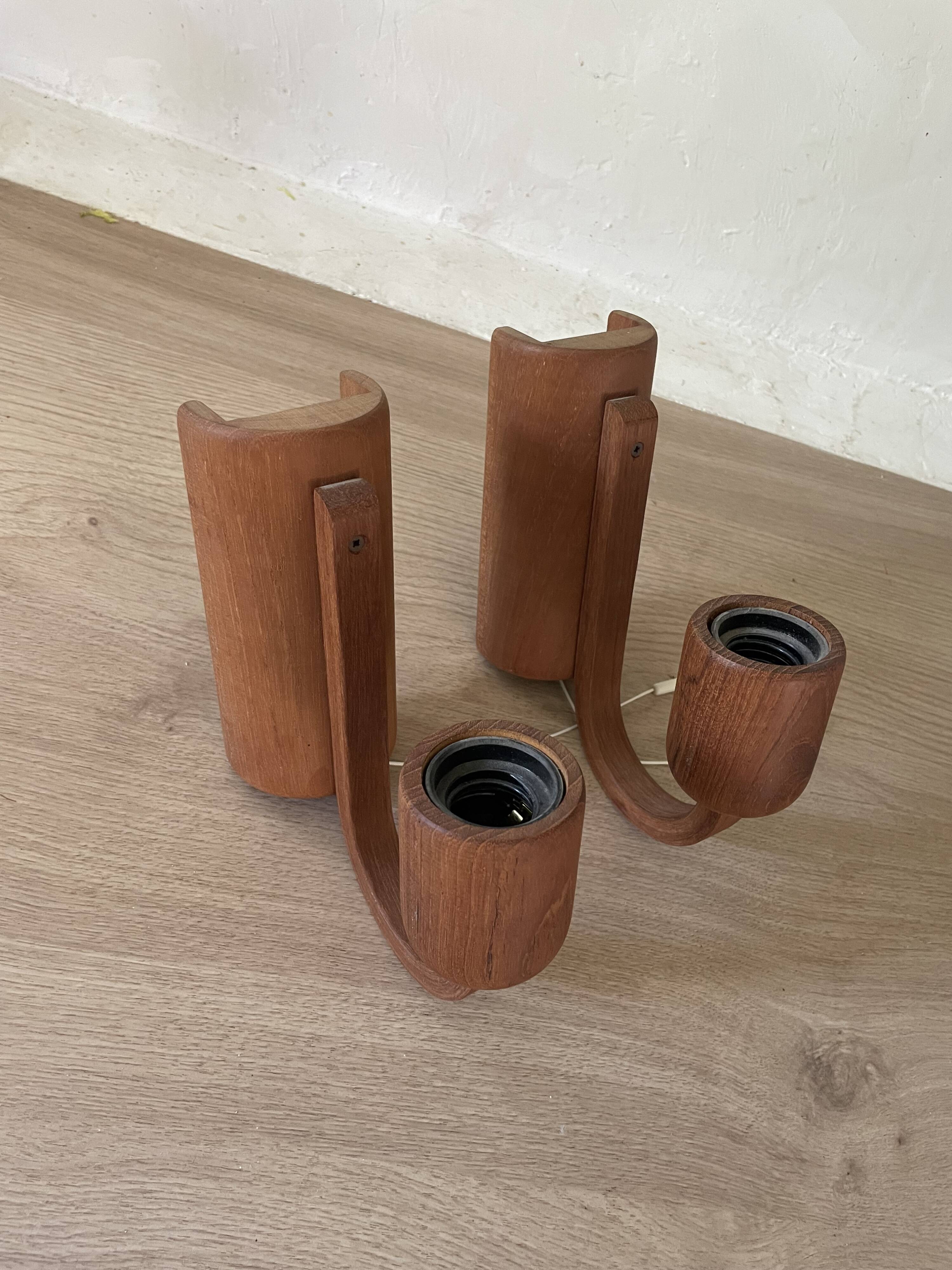 Pair of Scandinavian teak wall lights, Dolmus, 70s