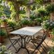 Bistro table marble and wrought iron