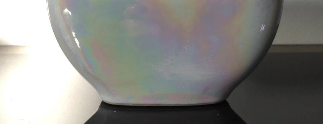 Vase, single flower holder in pearlescent glazed ceramic.