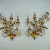 Pair of large floral wall lamps in gilded and lacquered metal. Italy 1960s