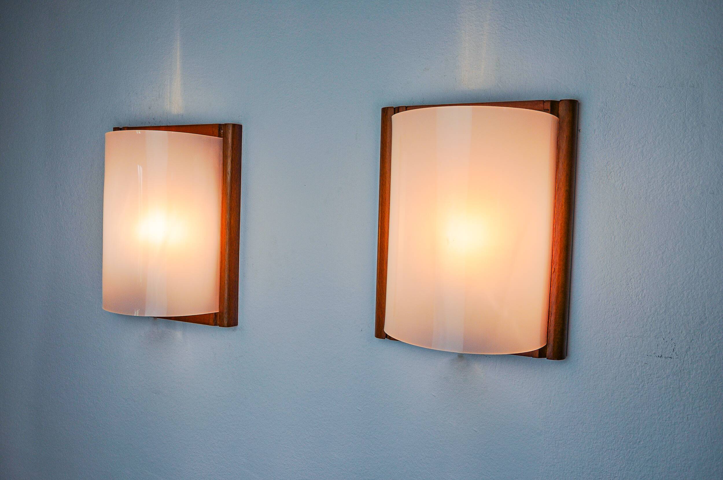 Pair of pine and methacrylate wall lights, Spain 1980