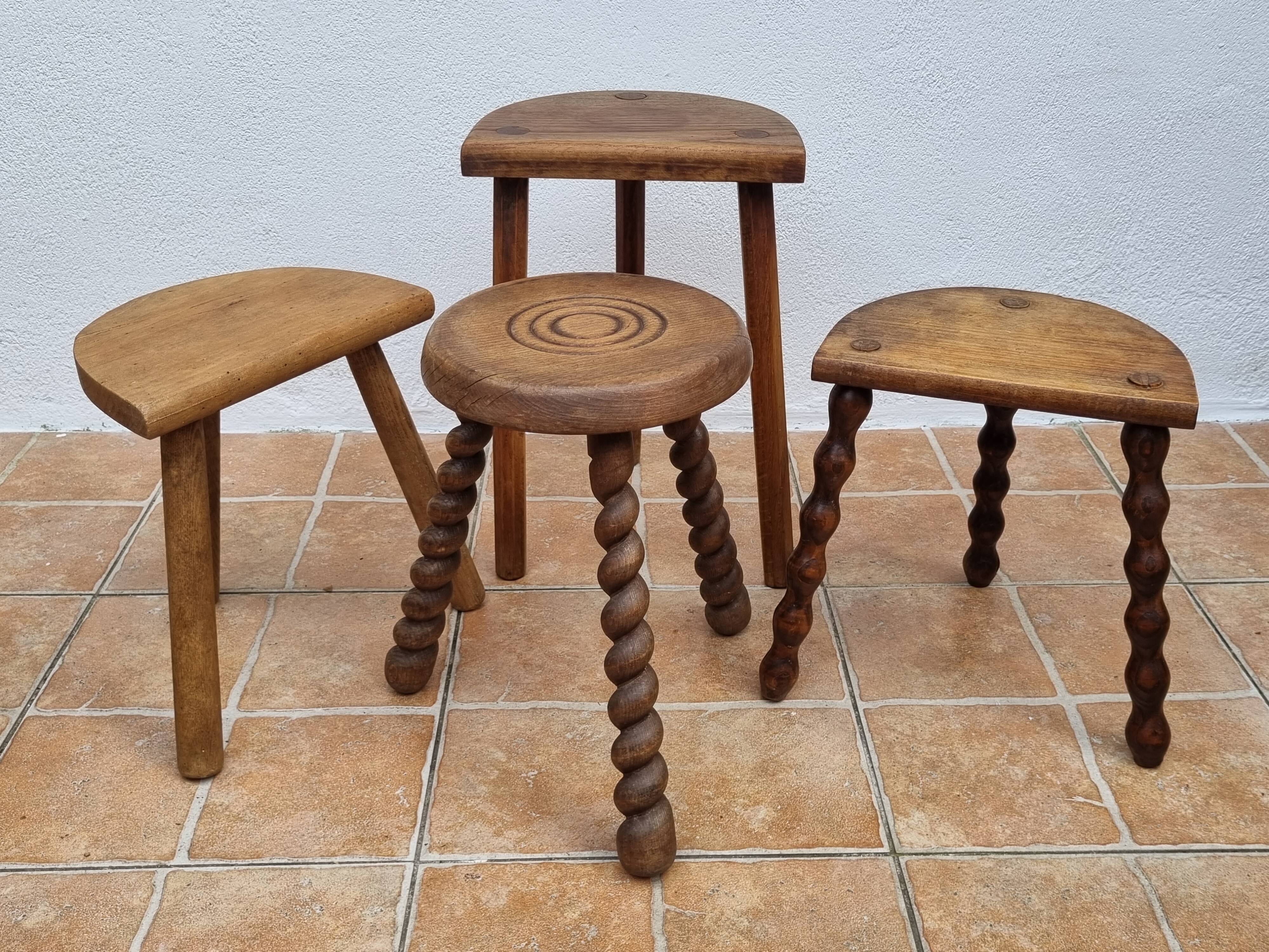 Set of four rustic solid wood plant holders, 31 to 43 cm