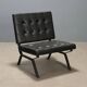 Vintage armchair in metal and black faux leather, Italian design from the 1970s.