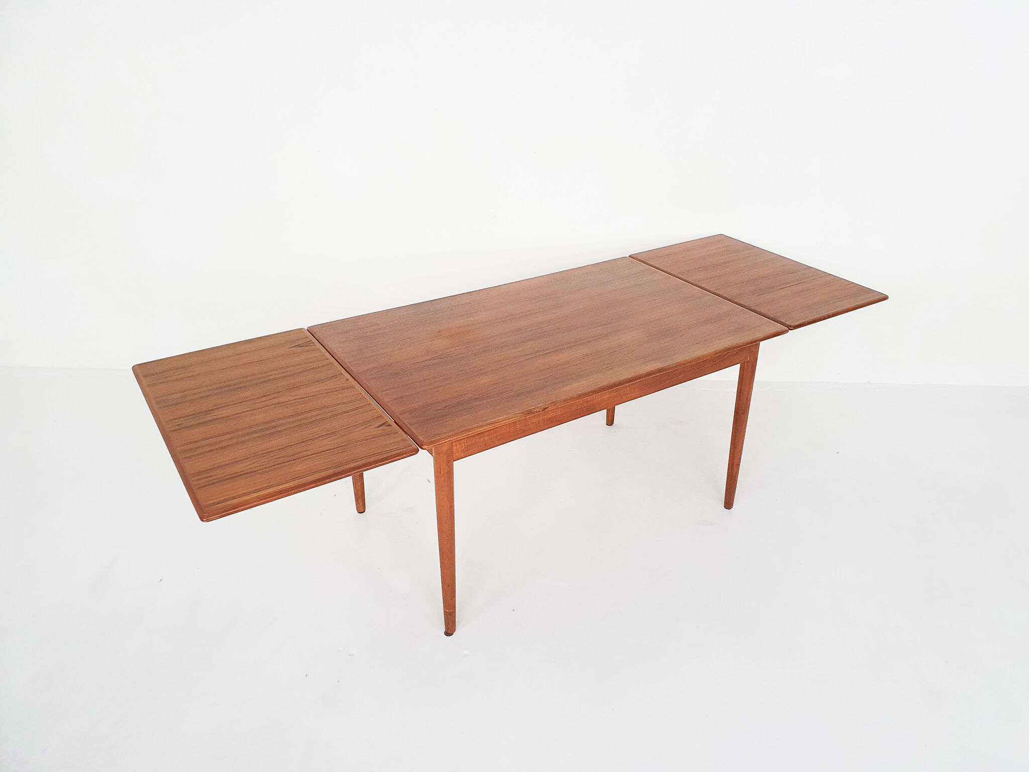 Scandinavian modern teak extendable dining table, 1950's
