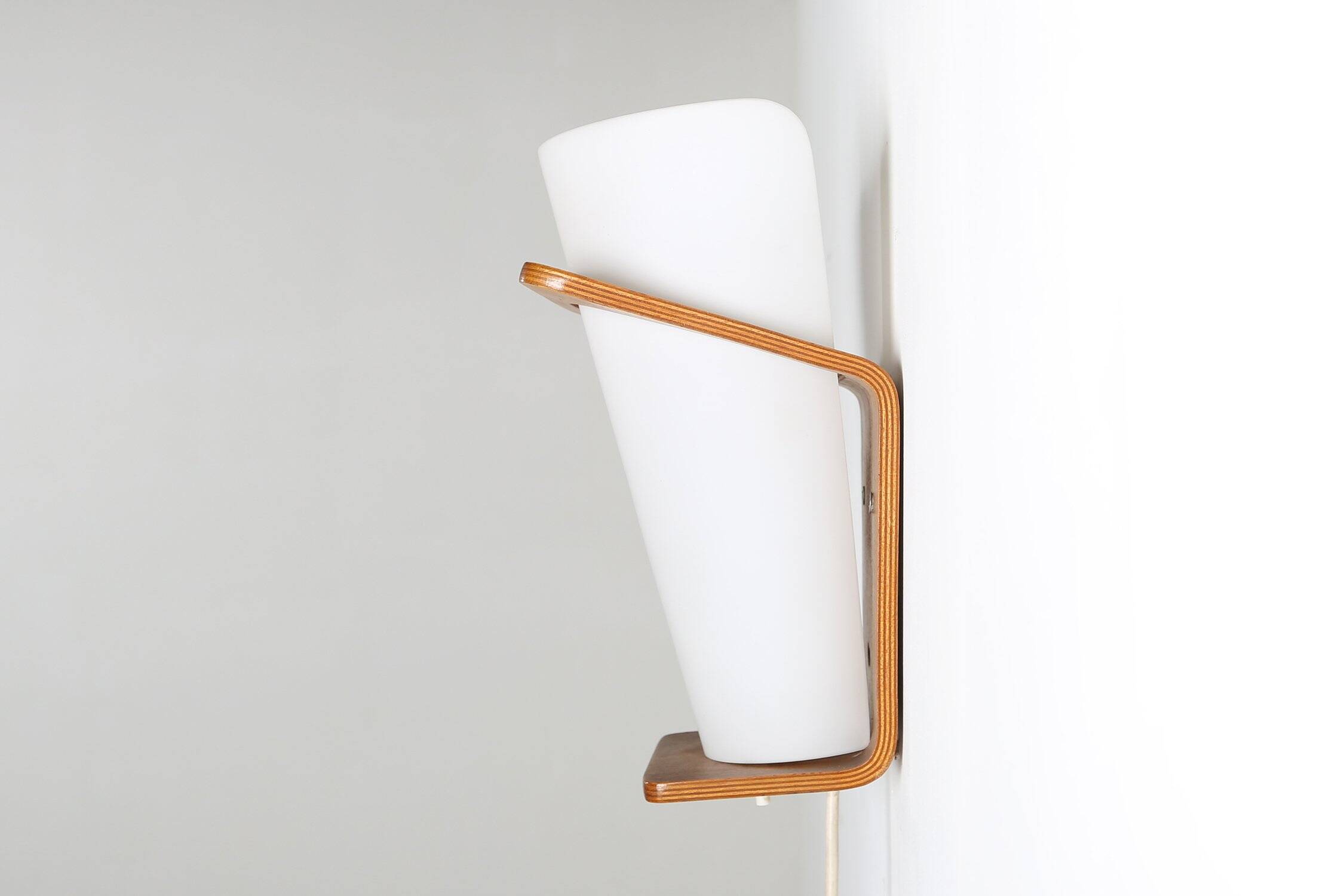 Wall Lamp in Curved Teak Plywood by Louis Kalff for Philips, 1959