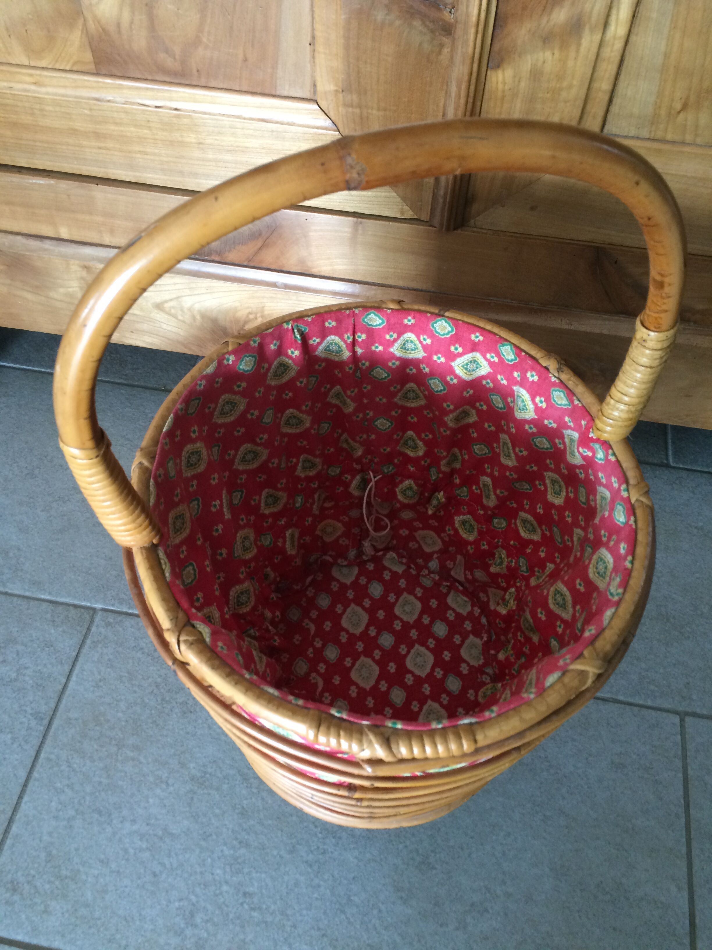 Rattan-work basket with vintage fabric