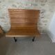 Train bench or metro in wood 1900 with its luggage rack