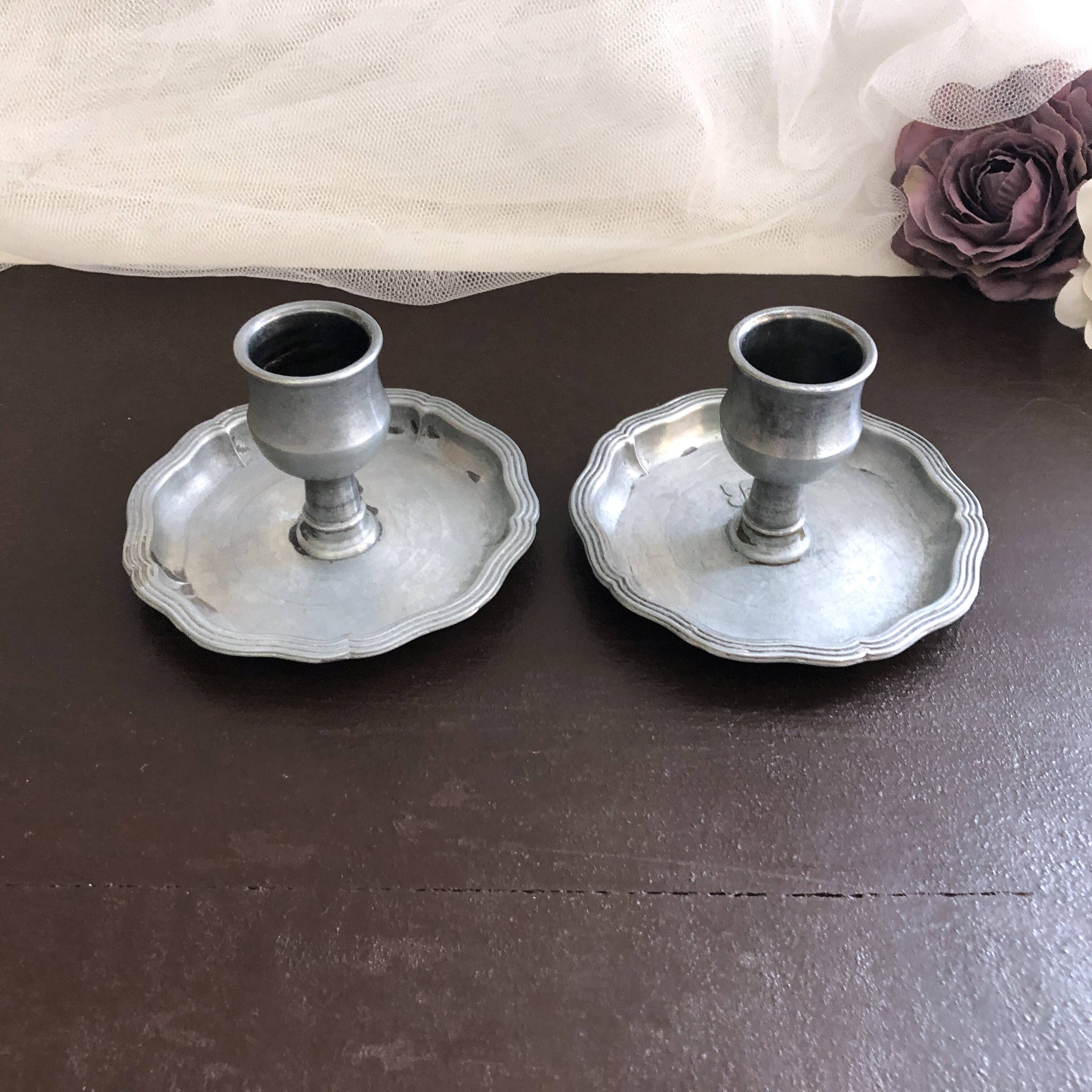 Pair of pewter table candlesticks