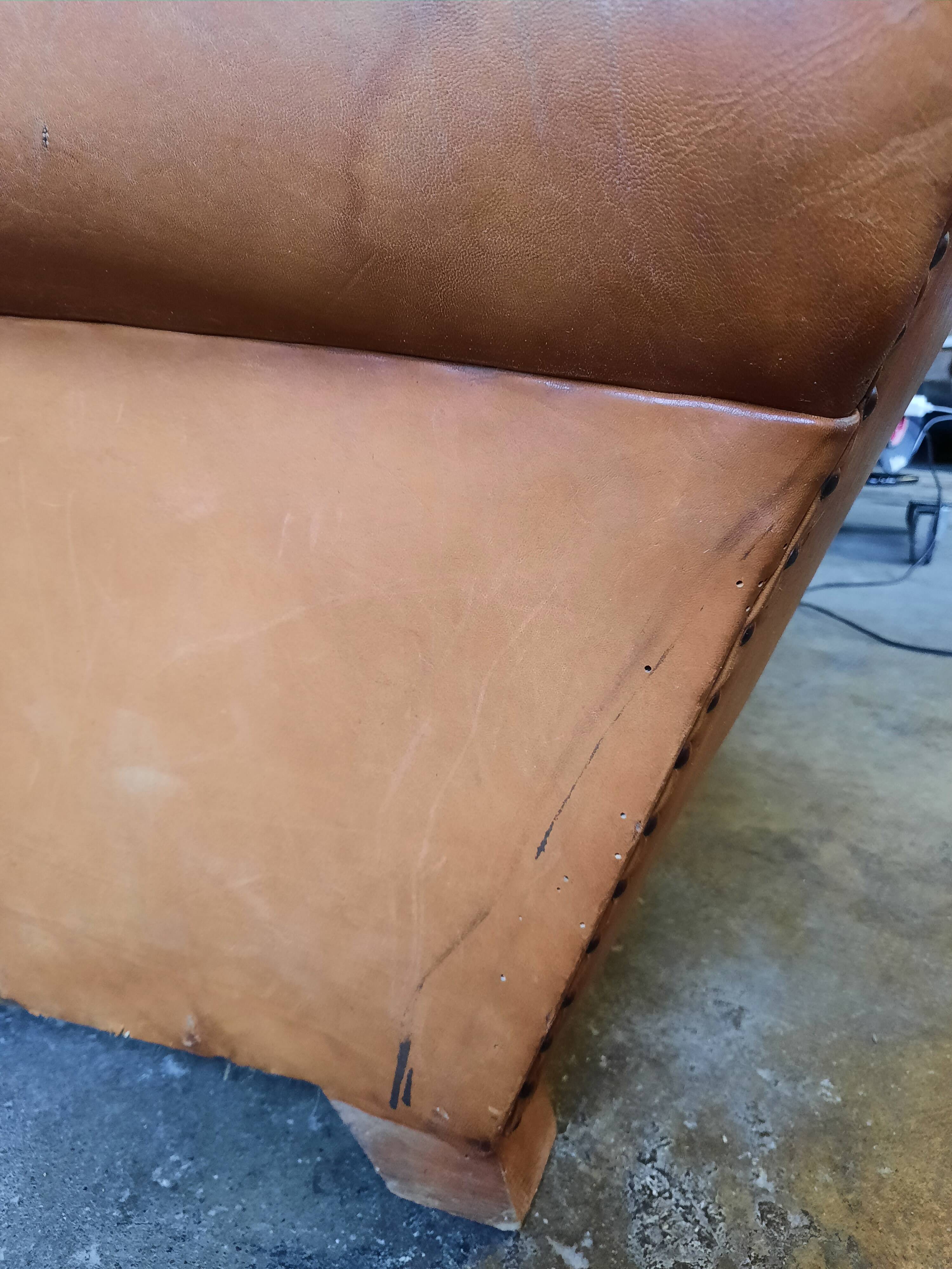 Old leather club chair 1940-1950