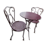 Set of two chairs and wrought iron pedestal table