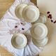 6 antique off-white porcelain soup plates with gold rim from Limoges