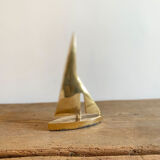 Golden brass sailboat