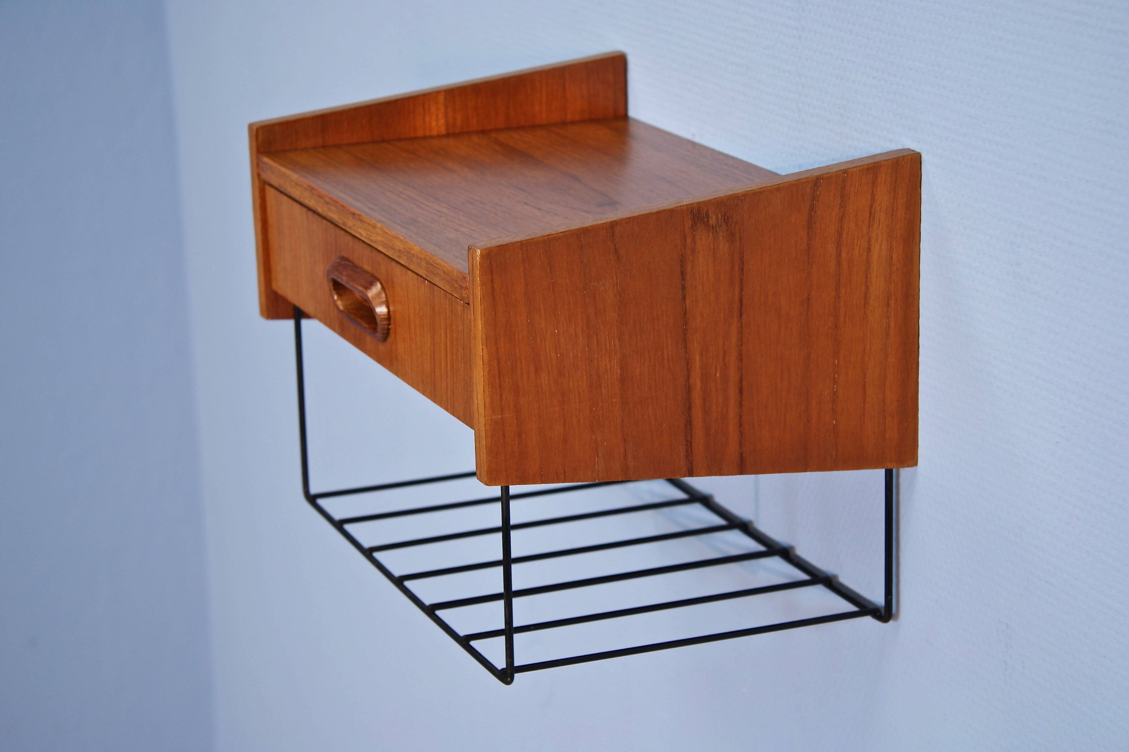 Dutch wall shelf by Tomado in teak and metal, 1960s.