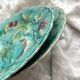 Two Onnaing barbotine bird plates, late 19th century