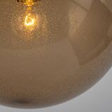 Large smoked glass ball pendant by Limburg with brass, Germany, 1970s.