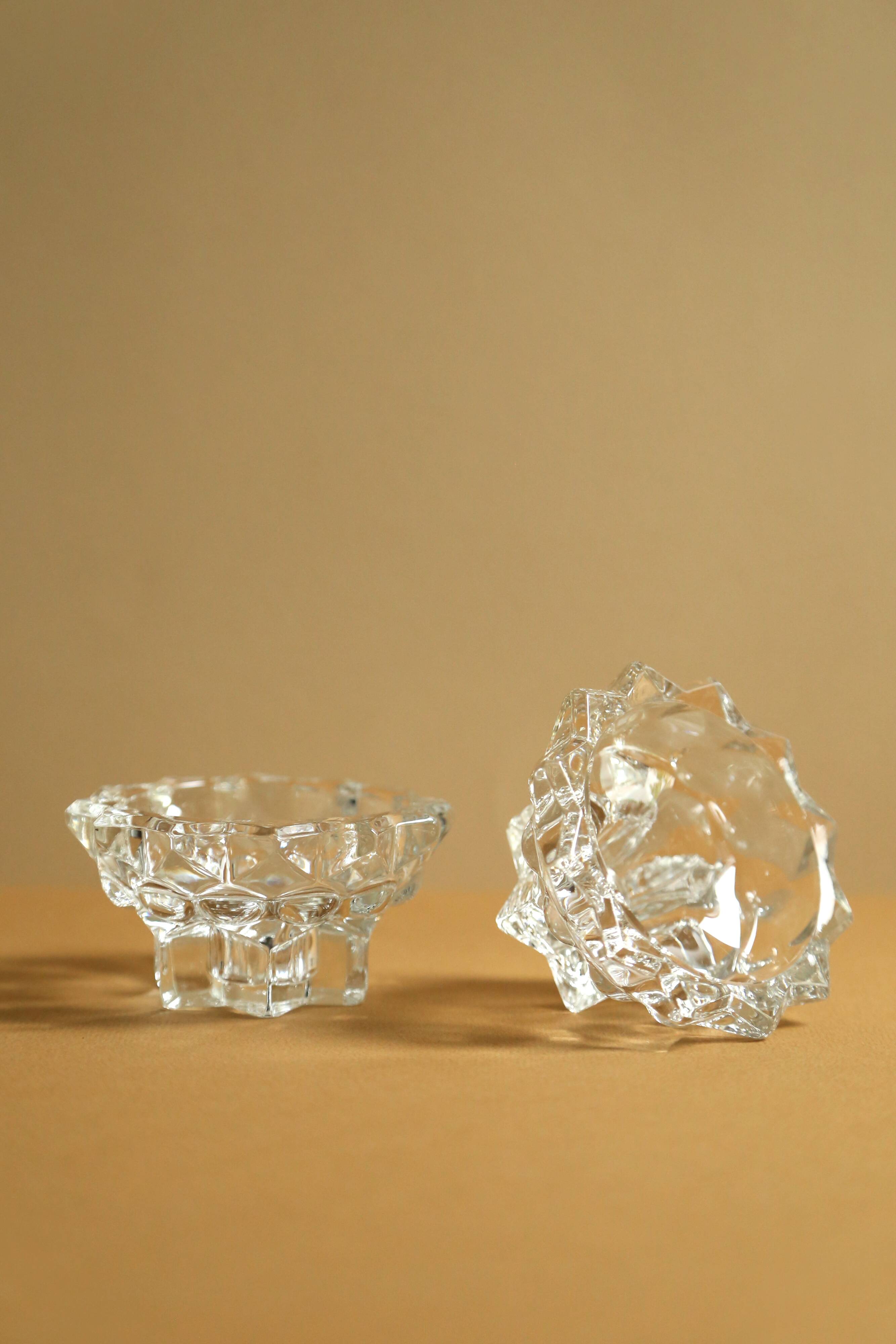 Pair of moulded glass candlesticks