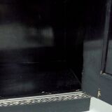 Antique wooden cabinet painted in black and with incised white painted decorations, Ettore Zaccari, Italy c 1910