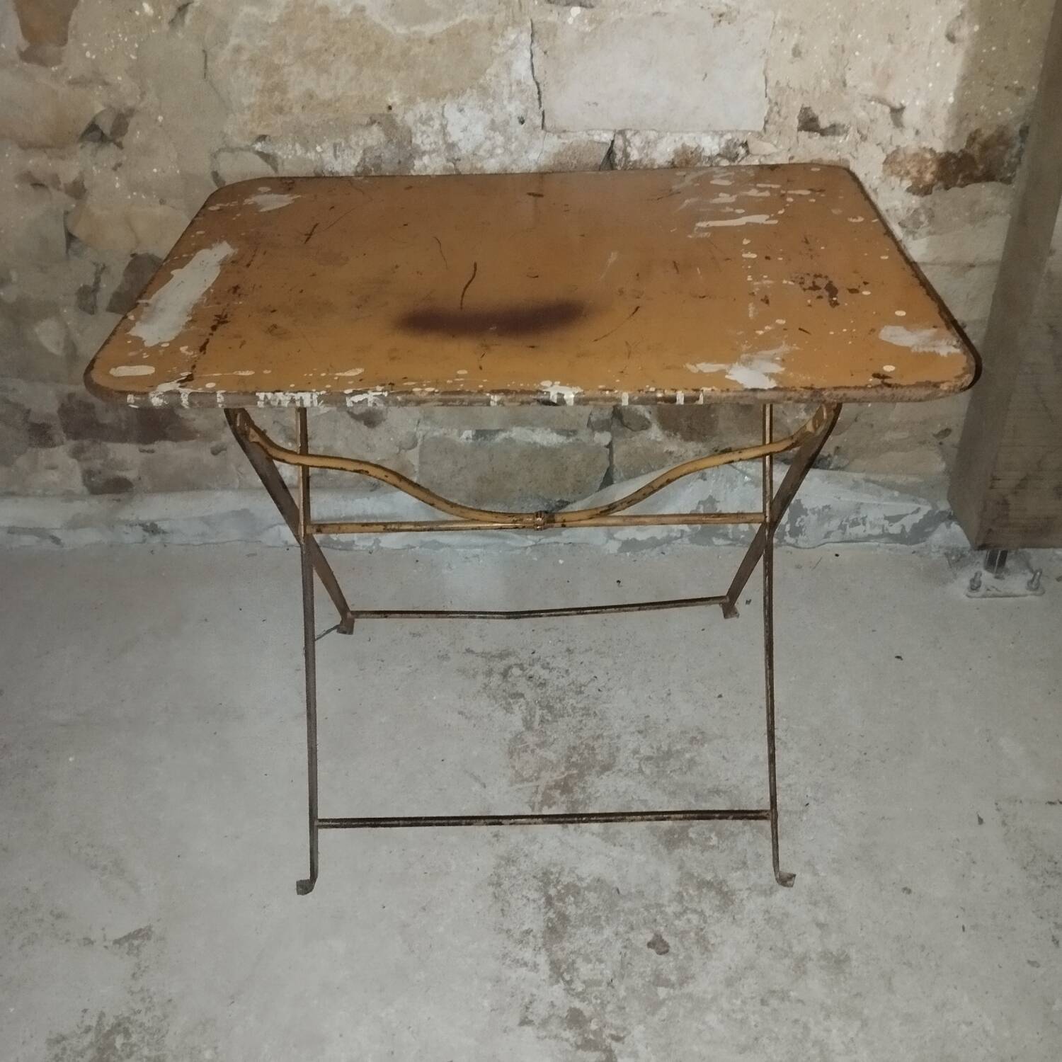 Folding wrought iron garden bistro table