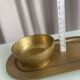 Empty pocket ensemble and bowl in solid brass signed Giò Lanciani.