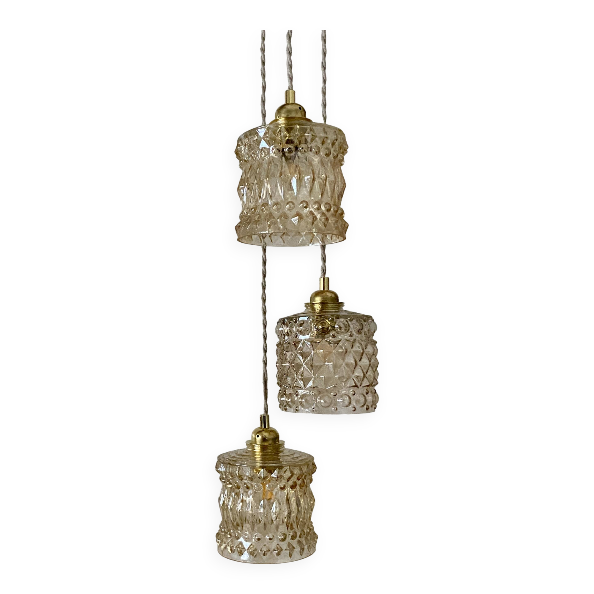 Triple antique globe pendant light in amber glass