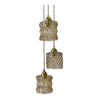 Triple antique globe pendant light in amber glass