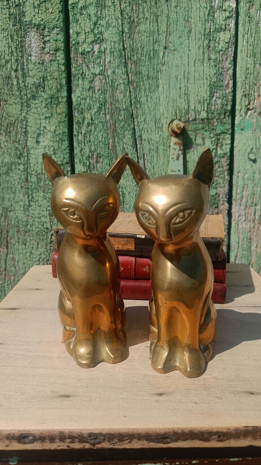 Gold-plated brass bookend cat