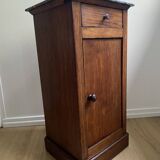 Vintage bedside table in the shape of a wooden column and a gray marble top