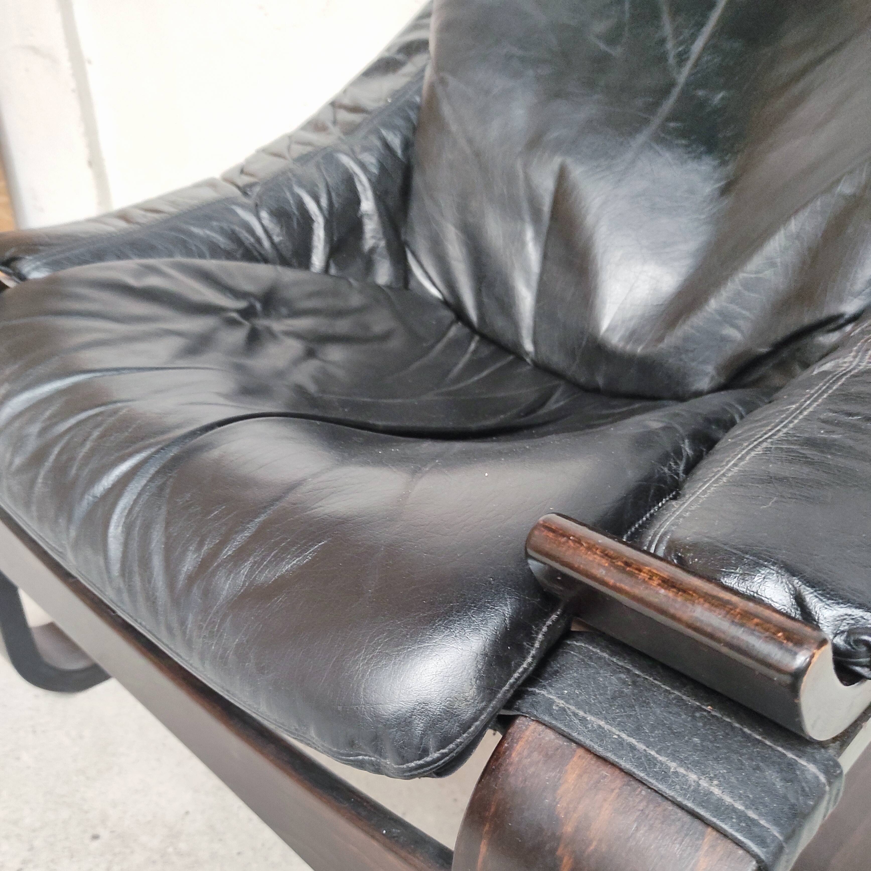 Pair of Kroken armchairs in black leather