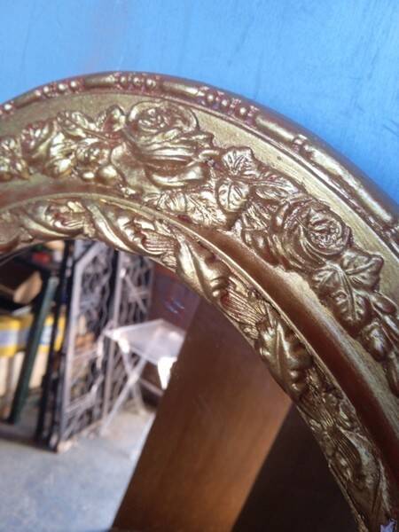 Oval mirror 134cm wood and gilded stucco early 20th century