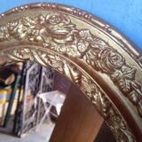 Oval mirror 134cm wood and gilded stucco early 20th century