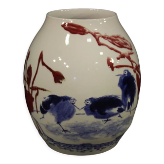 Chinese painted ceramic vase with floral and animal decorations