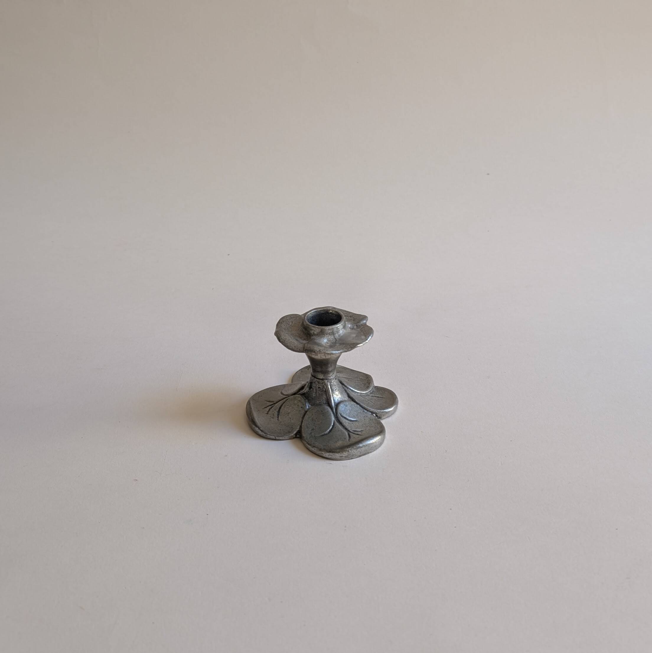Tin candle holder