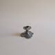 Tin candle holder