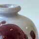 Ceramic vase by Jean and Robert Cloutier with fish decoration