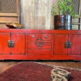Low cabinet in red lacquered elm