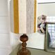 Large vintage lamp with turned wooden base, wool and rope striped lampshade