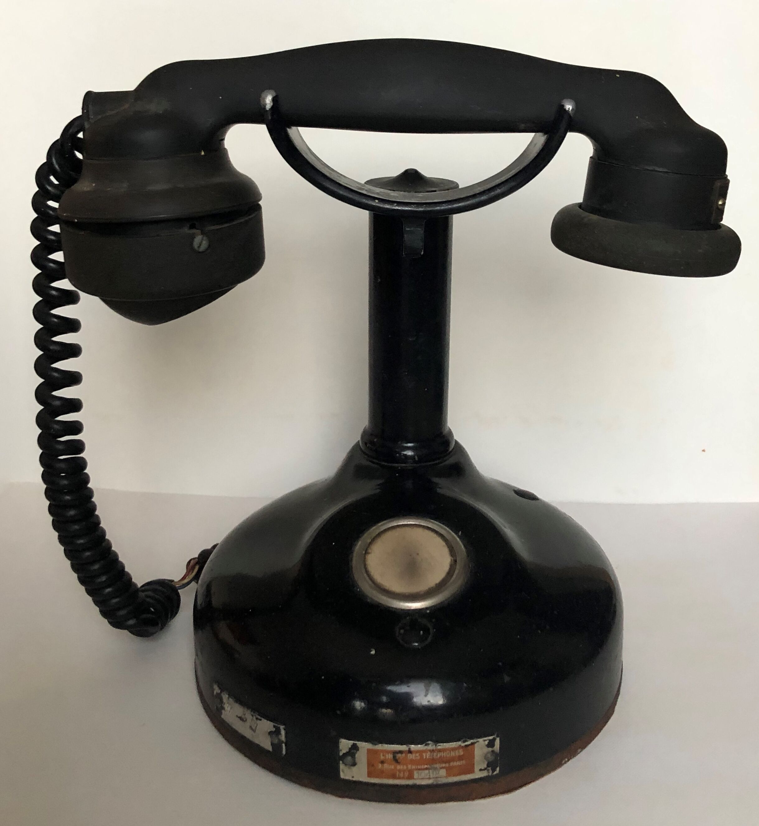 Old phone on column