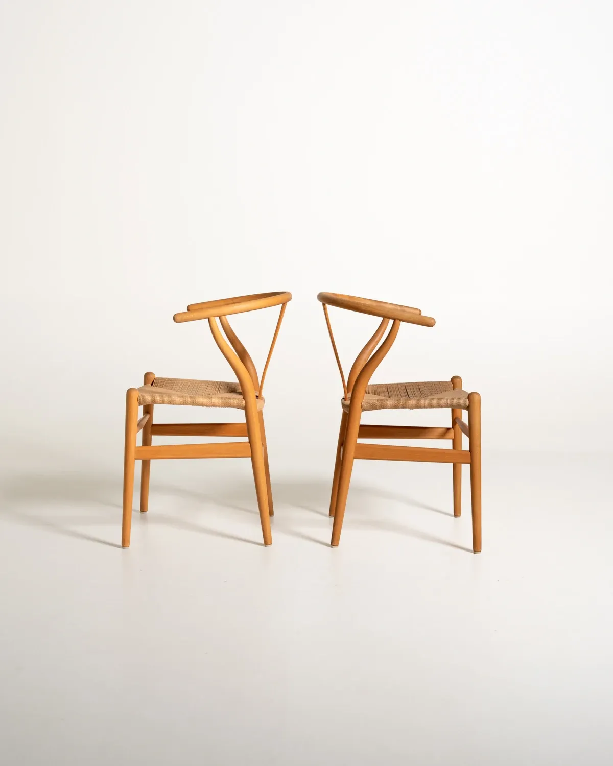 Set of four CH24 “Wishbone Chairs” by Hans J. Wegner, design 1950