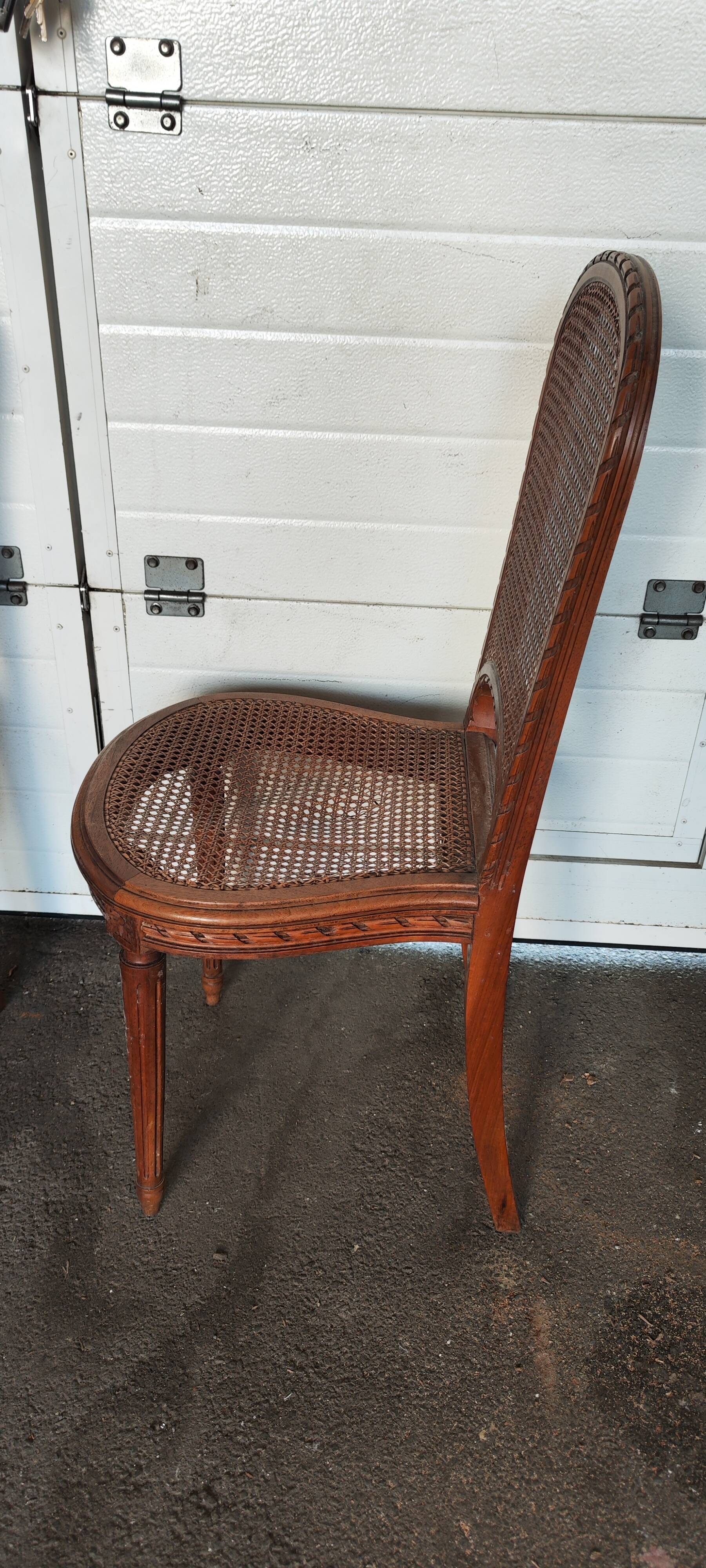 Set of six louis xvi style caned chairs