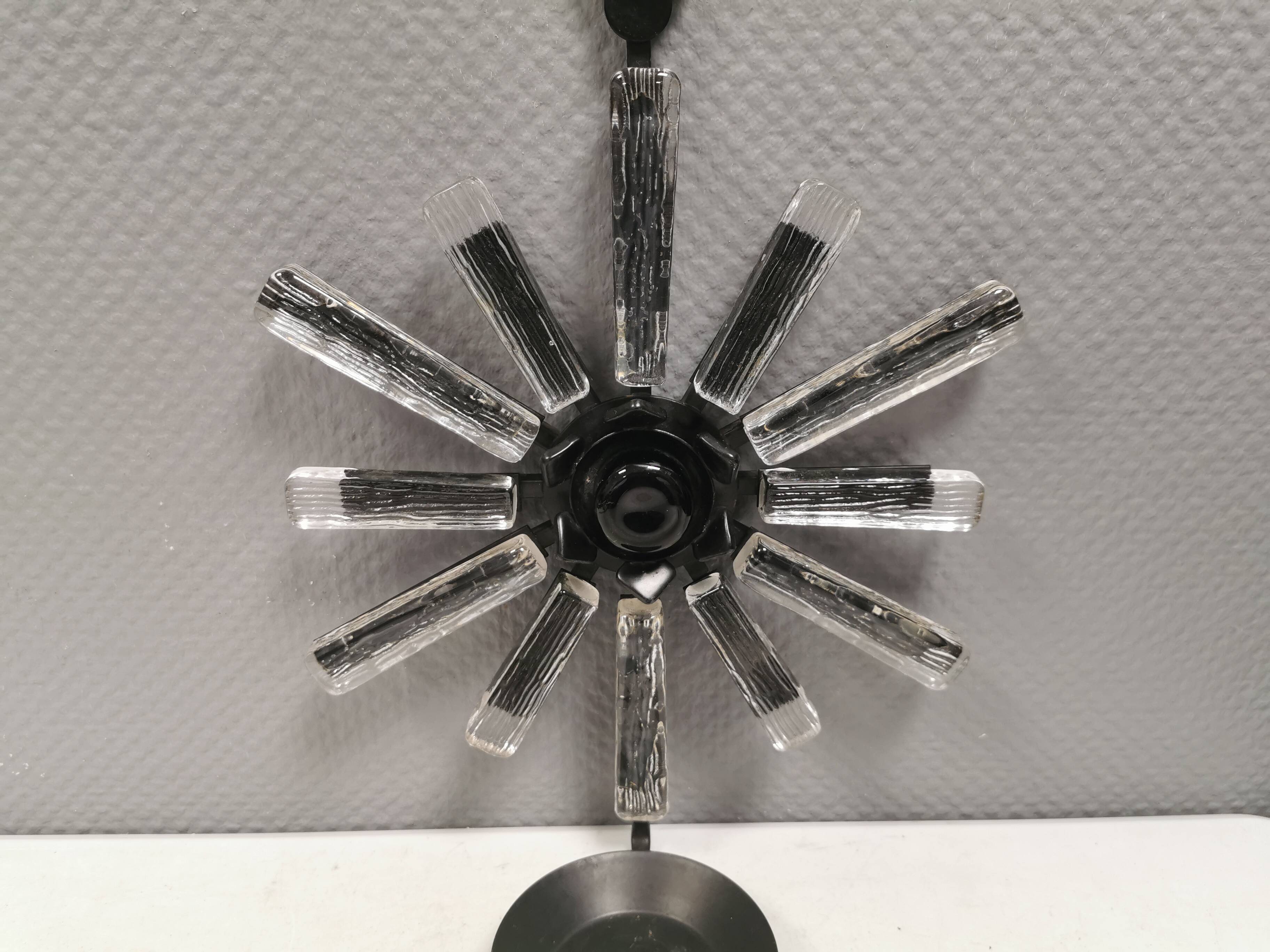 Vintage wrought-iron wall candle holder with pressed glass decoration 1970s